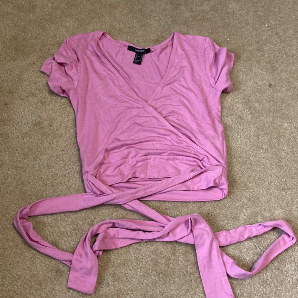 Cropped tie around shirt.